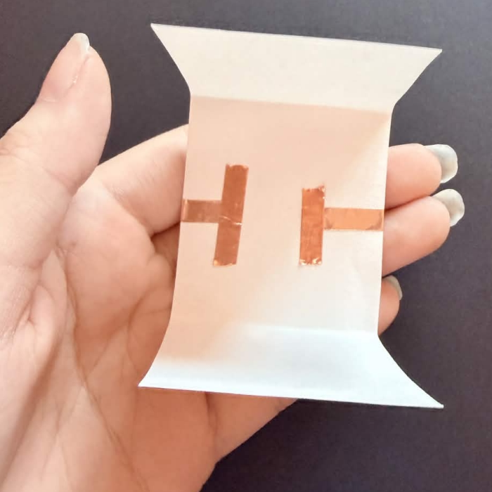 The underneath side I had to place the tape in opposite directions to have more surface to cover