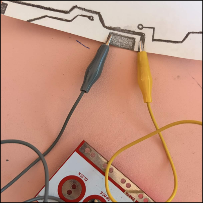 I created some motherboard inspired line art and connected the ground and one of the buttons.